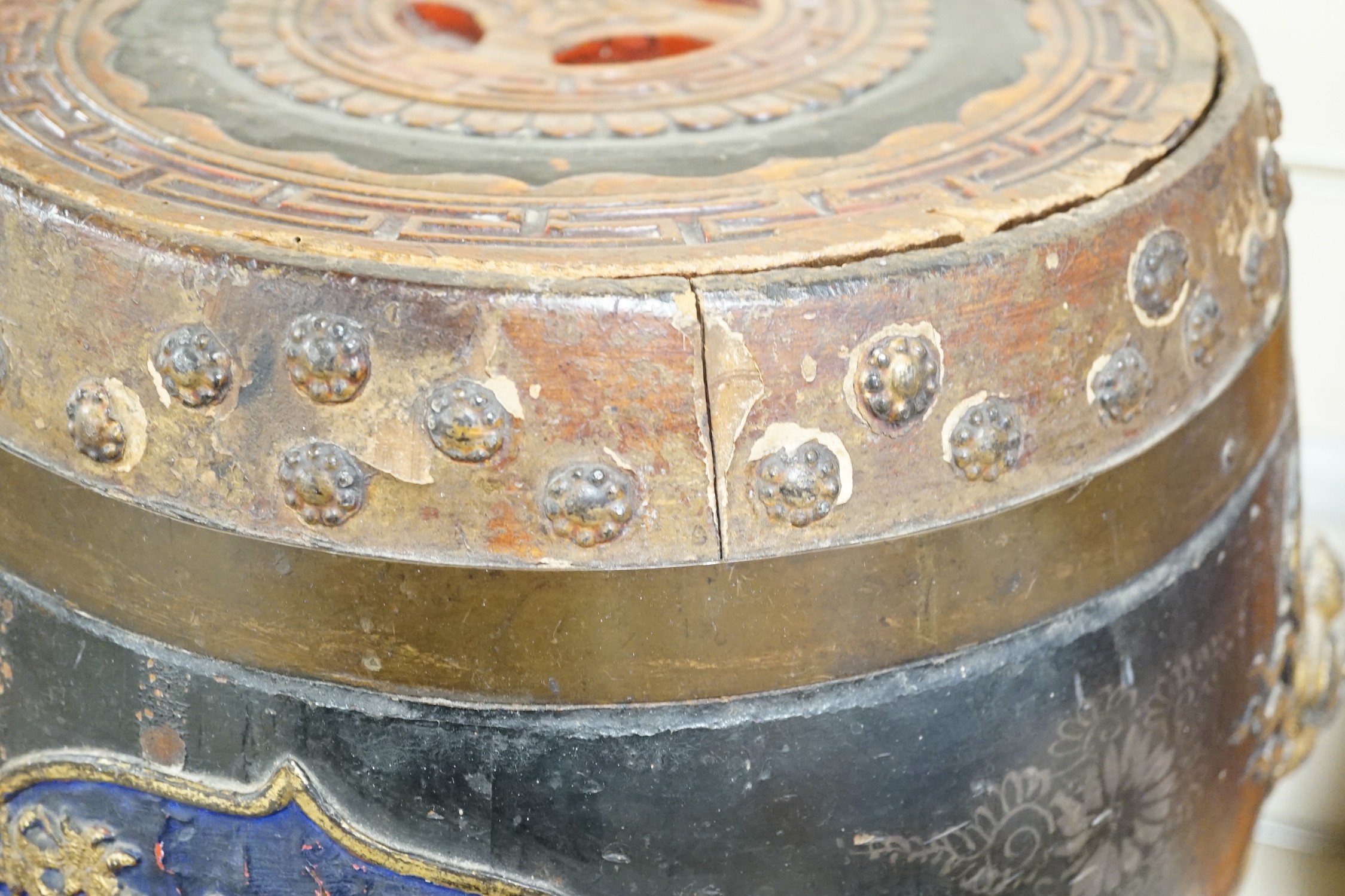 A Chinese lacquer decorated wood barrel form seat/storage container, 40cms high